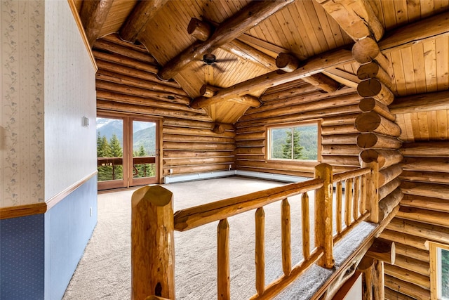 21 Barnes Ln, Noxon, MT 59853 - hall featuring a healthy amount of sunlight, beamed ceiling, carpet, and wood ceiling