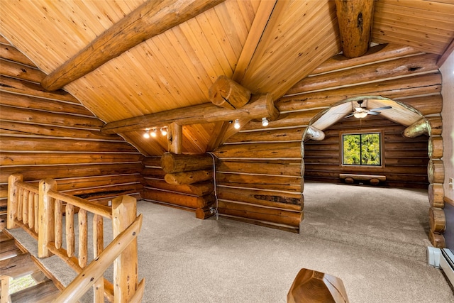 21 Barnes Ln, Noxon, MT 59853 - additional living space with a baseboard heating unit, wood ceiling, vaulted ceiling with beams, and carpet