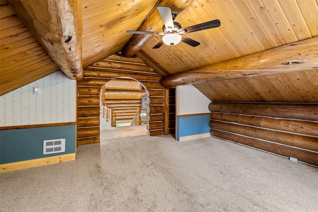 21 Barnes Ln, Noxon, MT 59853 - additional living space featuring wooden ceiling, lofted ceiling with beams, log walls, and carpet floors