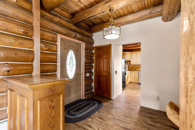 21 Barnes Ln, Noxon, MT 59853 - foyer entrance featuring wooden ceiling, light wood-type flooring, and beam ceiling