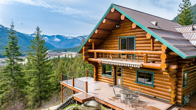 21 Barnes Ln, Noxon, MT 59853 - view of side of property featuring a deck with mountain view