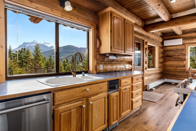 21 Barnes Ln, Noxon, MT 59853 - kitchen with beamed ceiling, wood ceiling, dishwasher, a mountain view, and a wall mounted air conditioner