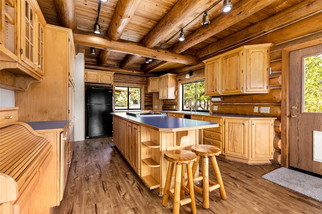 21 Barnes Ln, Noxon, MT 59853 - kitchen with black appliances, wooden ceiling, a kitchen island, and hardwood / wood-style flooring