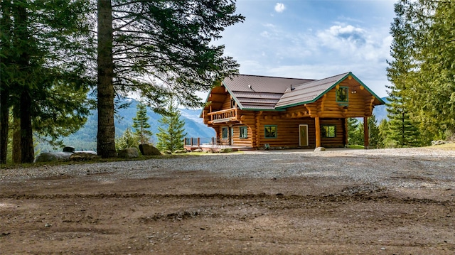 21 Barnes Ln, Noxon, MT 59853 - back of property featuring a mountain view and a balcony