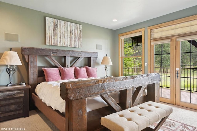 290 Wilderness Club Dr, Eureka, MT 59917 - bedroom featuring recessed lighting, light colored carpet, and access to exterior