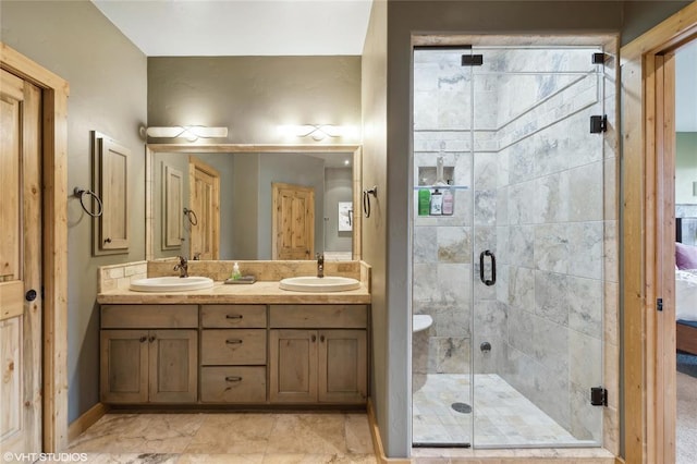 290 Wilderness Club Dr, Eureka, MT 59917 - full bath featuring double vanity, a stall shower, and a sink