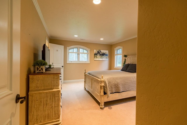 bedroom with baseboards, carpet floors, a textured wall, and crown molding