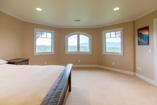 unfurnished bedroom with crown molding, recessed lighting, visible vents, light carpet, and baseboards