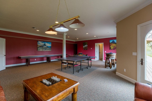 game room featuring baseboards, visible vents, ornamental molding, carpet flooring, and ornate columns