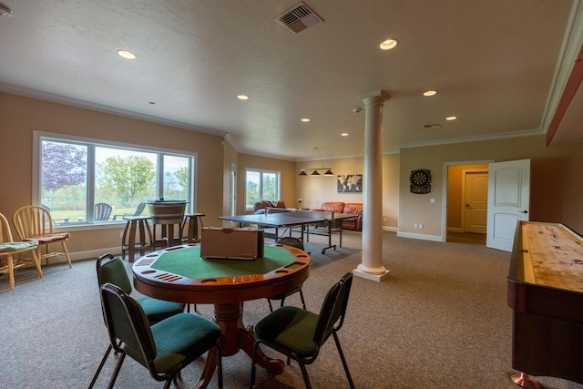 game room featuring carpet floors, ornate columns, baseboards, and visible vents