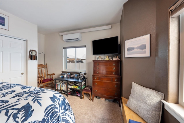 bedroom featuring carpet floors and an AC wall unit