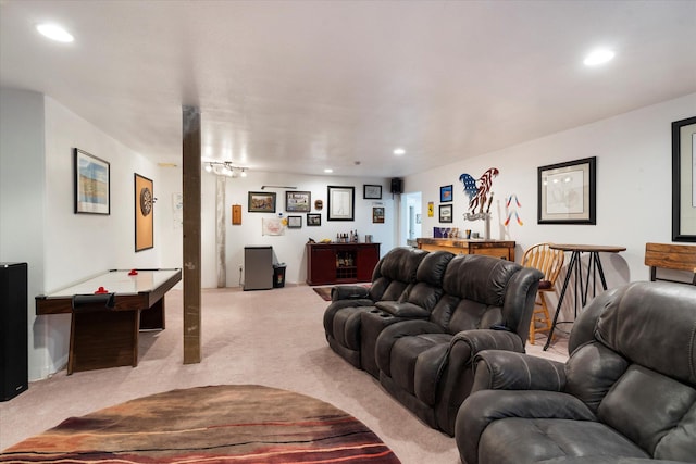 living room featuring recessed lighting and light carpet