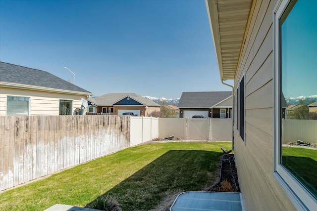 view of yard featuring a fenced backyard