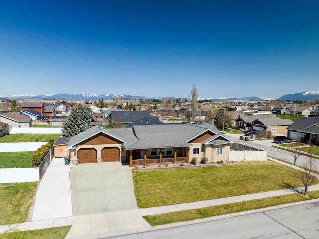 single story home featuring a residential view, fence, and a porch