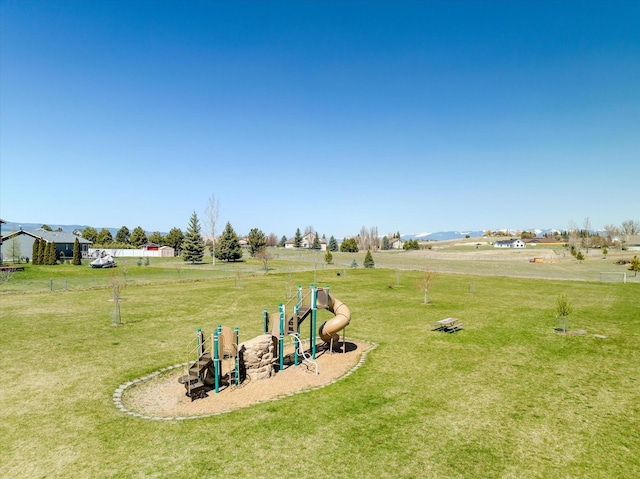 view of yard featuring playground community