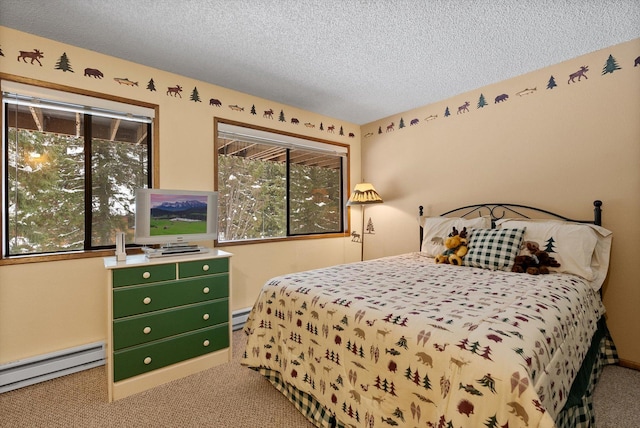 carpeted bedroom featuring a baseboard heating unit, a textured ceiling, and a baseboard radiator