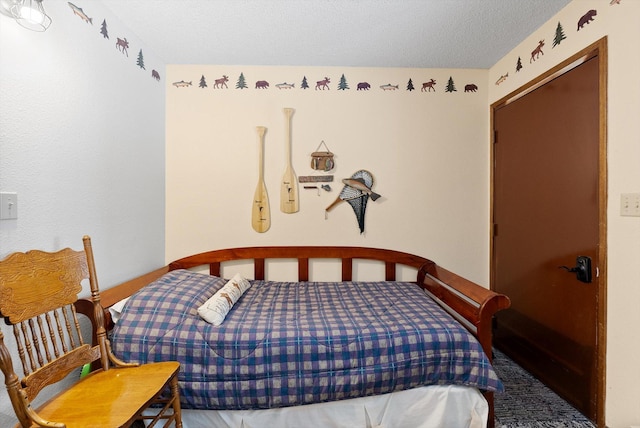 71 Limber Pne Unit 71, Whitefish, MT 59937 - bedroom featuring carpet floors and a textured ceiling