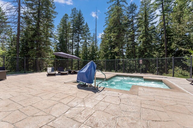 71 Limber Pne Unit 71, Whitefish, MT 59937 - view of swimming pool with a patio area