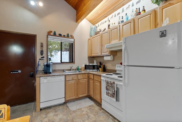 71 Limber Pne Unit 71, Whitefish, MT 59937 - kitchen featuring white appliances, under cabinet range hood, wooden ceiling, light brown cabinets, and light countertops