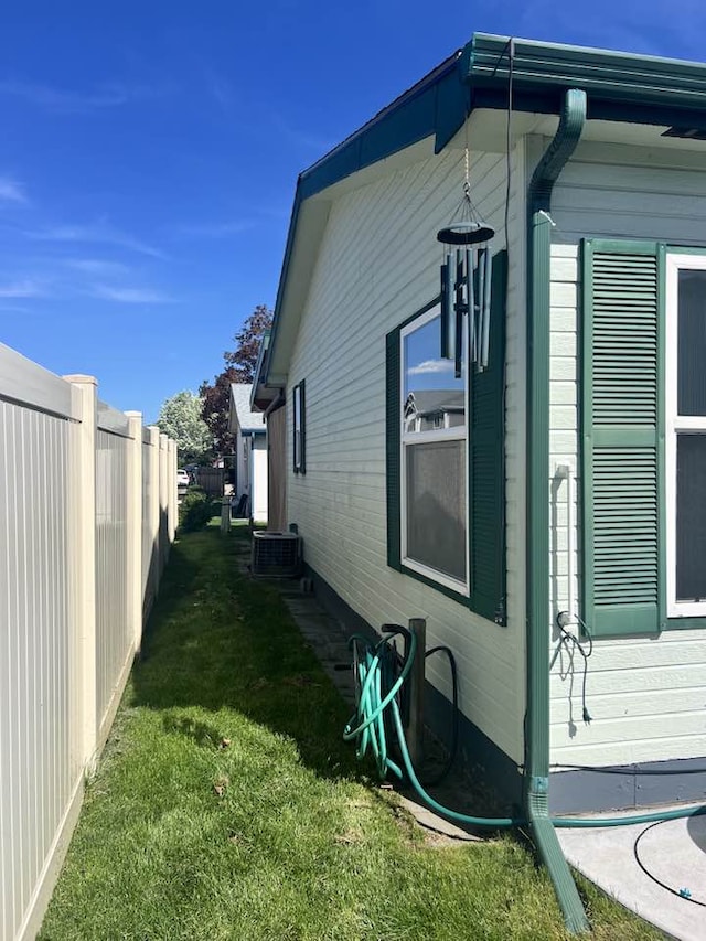 2452 Mcintosh Loop, Missoula, MT 59801 - view of side of home featuring central air condition unit