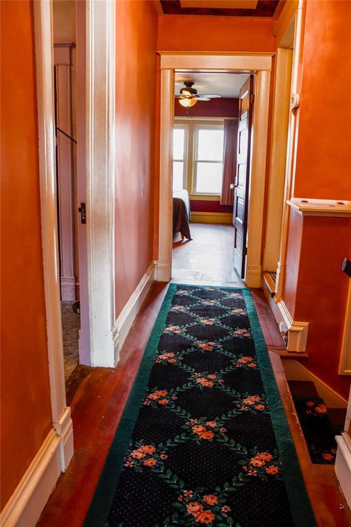 202 3rd St, Havre, MT 59501 - corridor with wood finished floors and baseboards