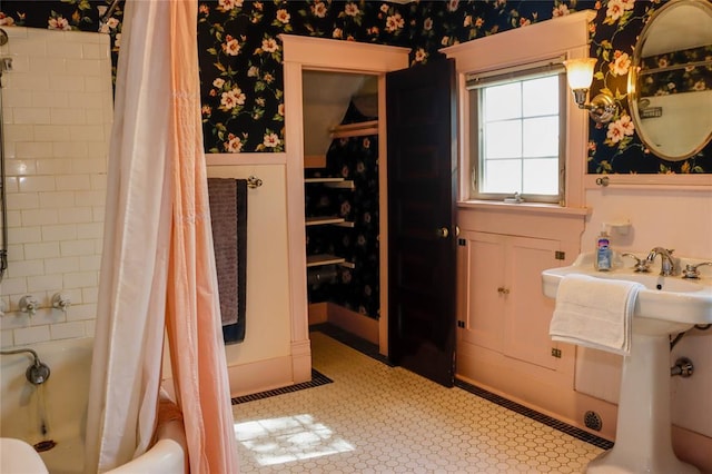 202 3rd St, Havre, MT 59501 - full bath featuring wallpapered walls, shower / bath combination with curtain, and tile patterned floors