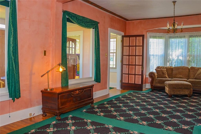 202 3rd St, Havre, MT 59501 - sitting room with a chandelier, healthy amount of natural light, and wood finished floors