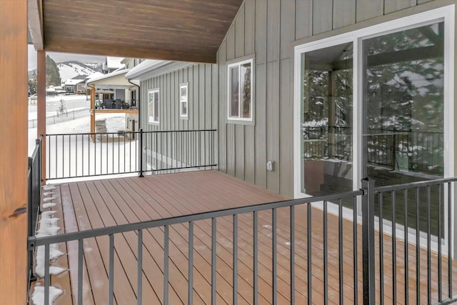 view of snow covered deck