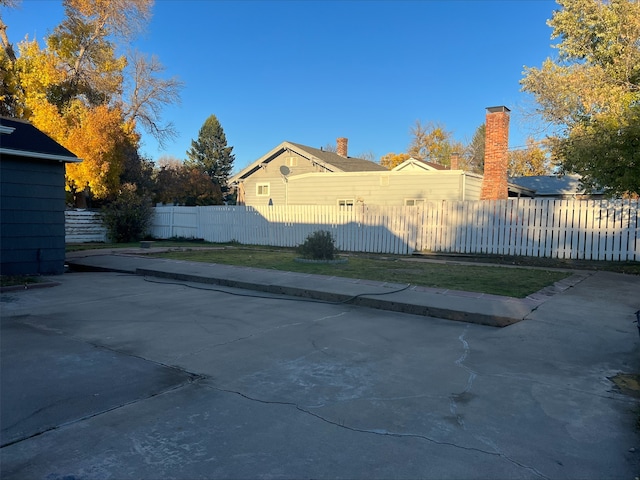 view of home's exterior with fence private yard