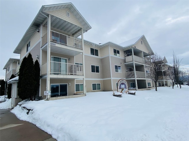 view of snow covered building