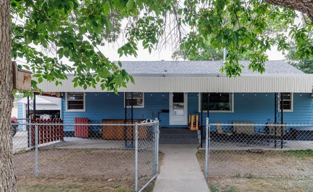 3501 1st Ave S, Great Falls, MT 59401 - view of front of property with a fenced front yard and roof with shingles