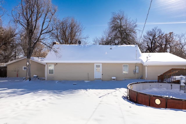 view of snow covered property