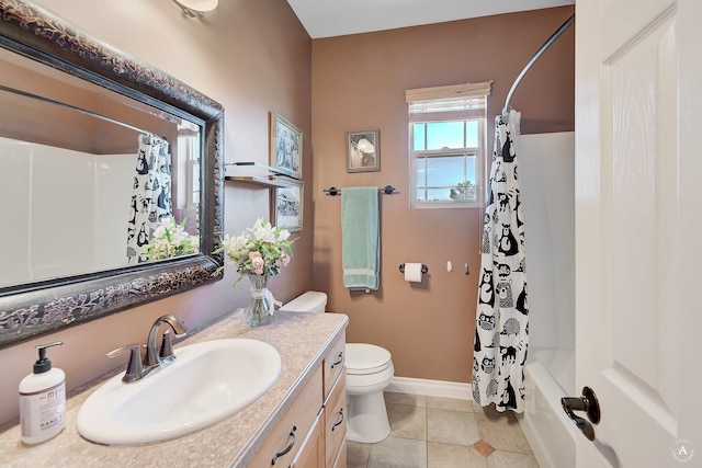 full bathroom with toilet, shower / tub combo, vanity, baseboards, and tile patterned floors