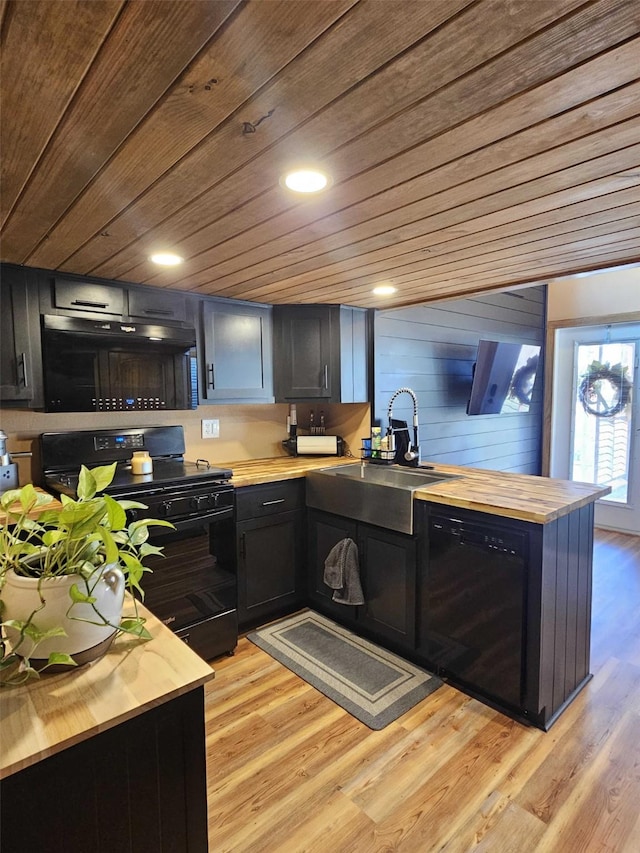 301 Kingfisher Loop, Eureka, MT 59917 - kitchen featuring black appliances, wooden ceiling, wooden counters, a sink, and light wood-style flooring