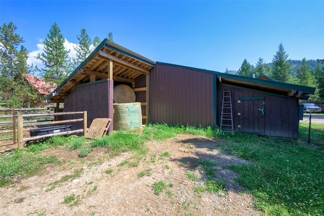 view of outbuilding featuring an exterior structure and an outdoor structure