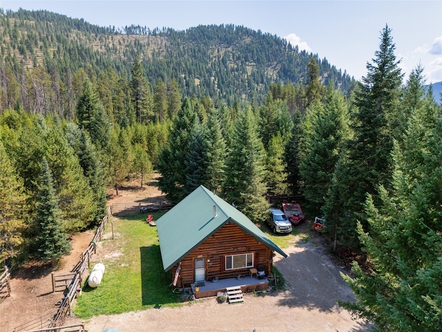 aerial view featuring a mountain view and a wooded view