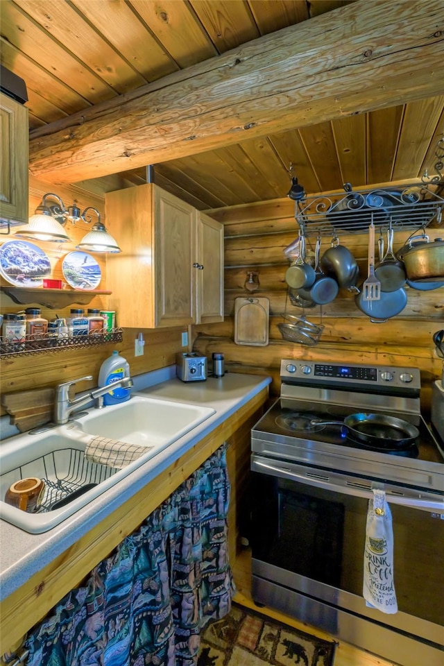 kitchen with wooden ceiling, stainless steel electric range oven, beamed ceiling, log walls, and light countertops