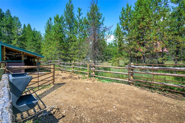 view of yard featuring an outbuilding and an exterior structure