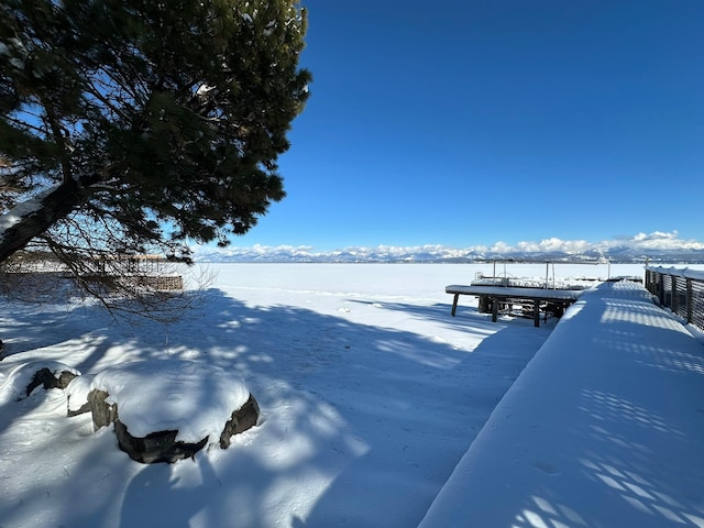 view of dock featuring fence