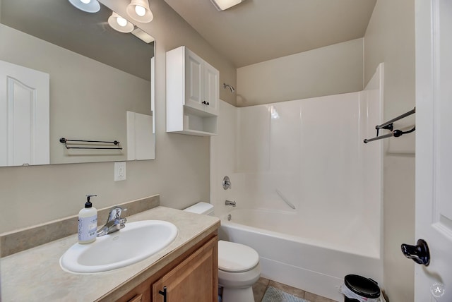 full bath with  shower combination, toilet, and vanity