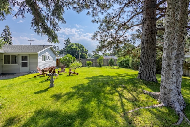 view of yard with fence