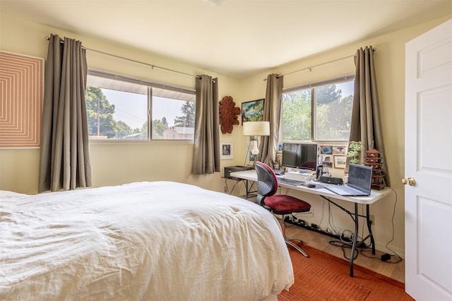 bedroom featuring wood finished floors