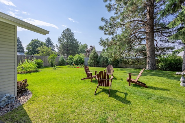 view of yard with a fenced backyard