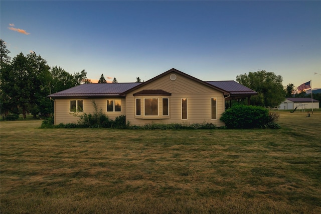 4901 Hoblitt Ln S, Florence, MT 59833 - view of front of house with a yard and metal roof