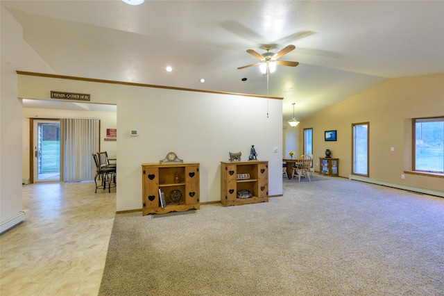 4901 Hoblitt Ln S, Florence, MT 59833 - living area featuring vaulted ceiling, healthy amount of natural light, ceiling fan, a baseboard heating unit, and baseboards