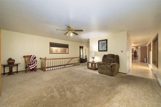 4901 Hoblitt Ln S, Florence, MT 59833 - sitting room with carpet, a ceiling fan, and baseboards