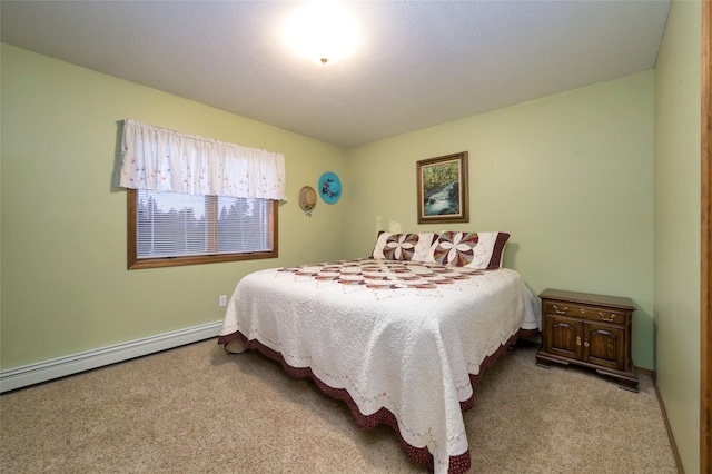 4901 Hoblitt Ln S, Florence, MT 59833 - bedroom featuring carpet floors, baseboard heating, and baseboards