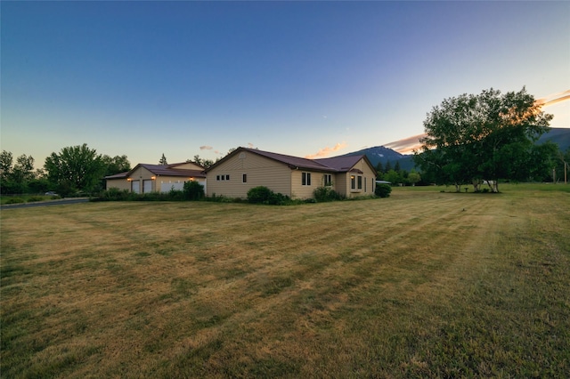 4901 Hoblitt Ln S, Florence, MT 59833 - yard at dusk featuring a yard