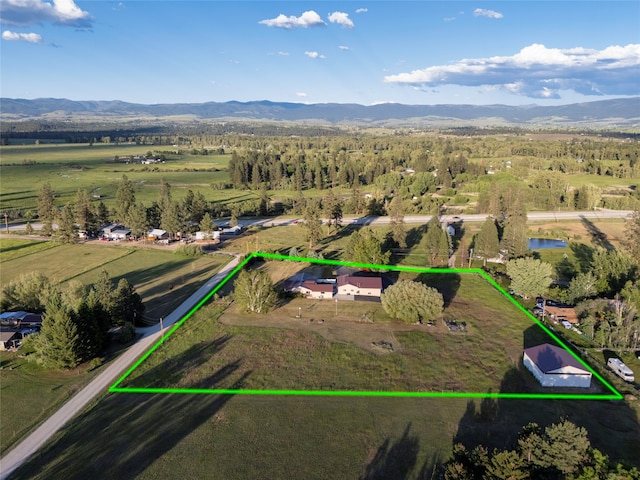 4901 Hoblitt Ln S, Florence, MT 59833 - overview of rural landscape featuring a mountain backdrop and property parcel outlined