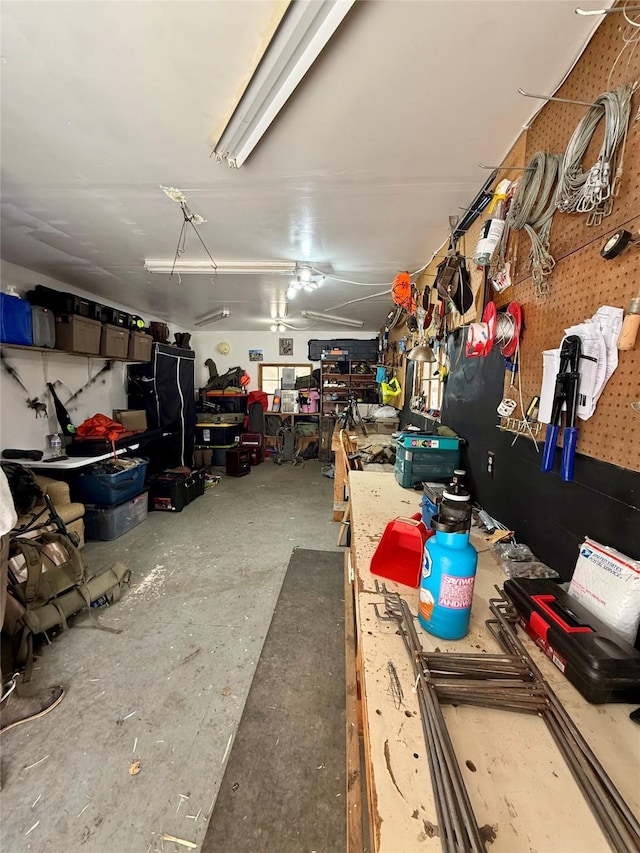 garage with a workshop area